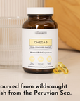 Brown glass bottle with white cap labeled "Omega-3 DHA + EPA Supplement" next to two yellow gel capsules and a striped glass.