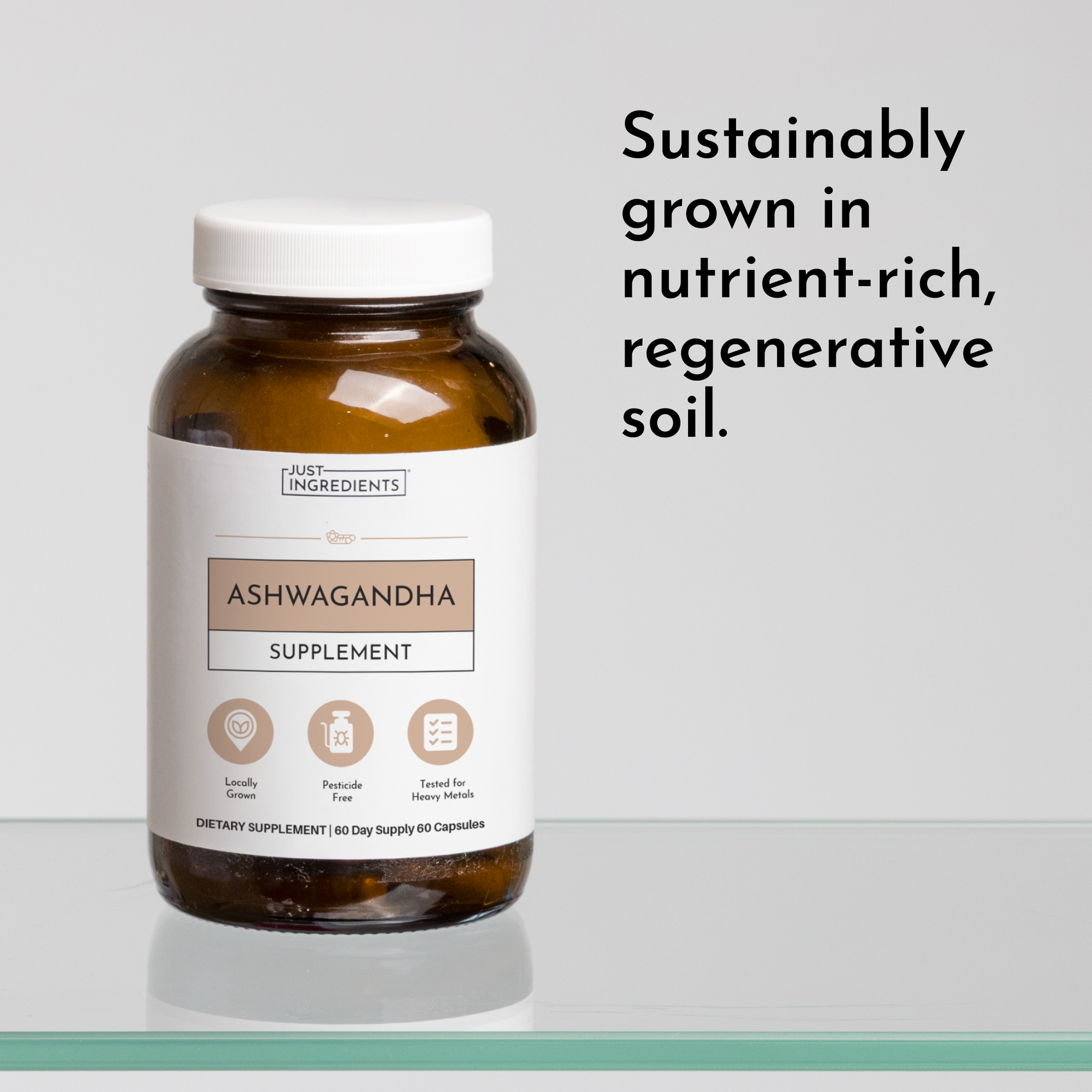 Amber glass bottle with white cap labeled "Just Ingredients Ashwagandha Supplement," containing 60 capsules.