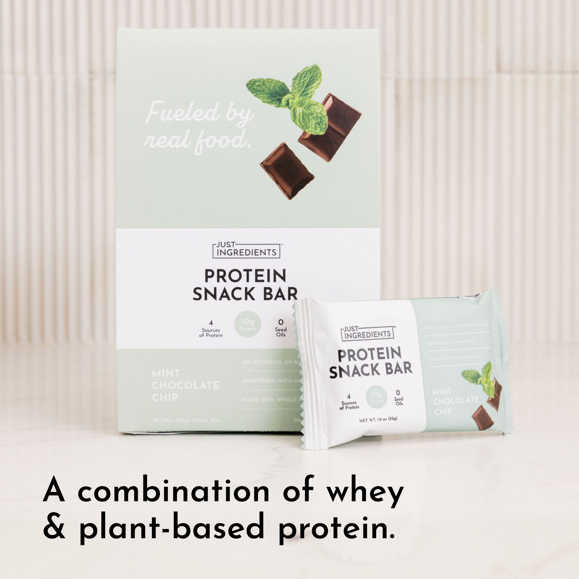 Box of 12 mint chocolate protein snack bars with a single bar displayed in front.