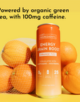 A can of Orange Fizz Energy + Brain Boost next to fresh oranges, set against a yellow background.
