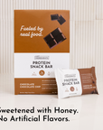 Box of protein snack bars with one individual bar displayed, featuring chocolate chocolate chip flavor and honey sweetening.
