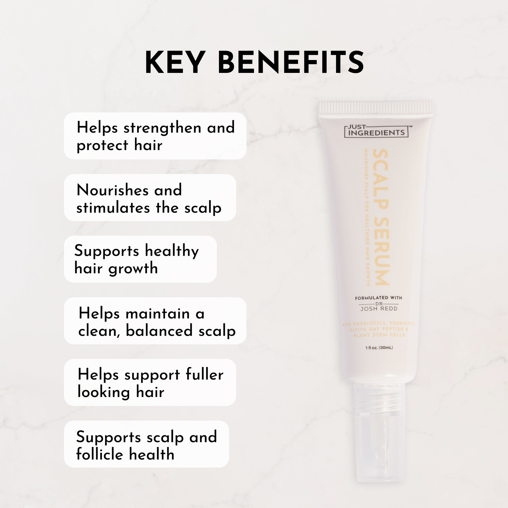 Scalp serum in a tube with key benefits listed beside it on a marble background.