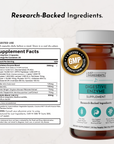 Brown glass bottle of digestive enzyme supplement capsules with white ribbed cap and teal label, alongside supplement facts p