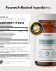 Amber glass supplement bottle with white cap containing Magnesium Complex capsules, alongside product information card detail