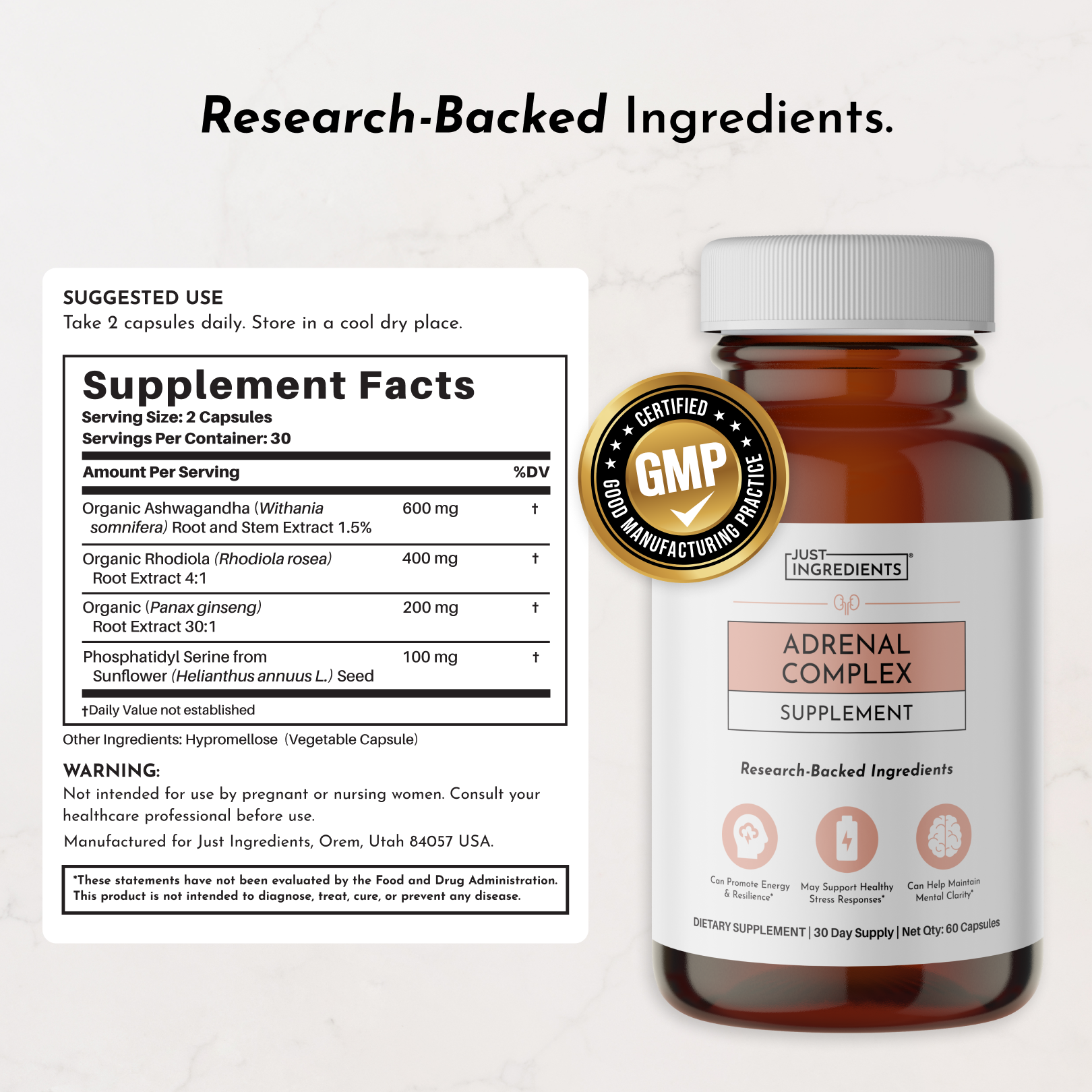 Amber glass bottle of Adrenal Complex supplement with white cap, label showing ingredients and GMP certification seal.