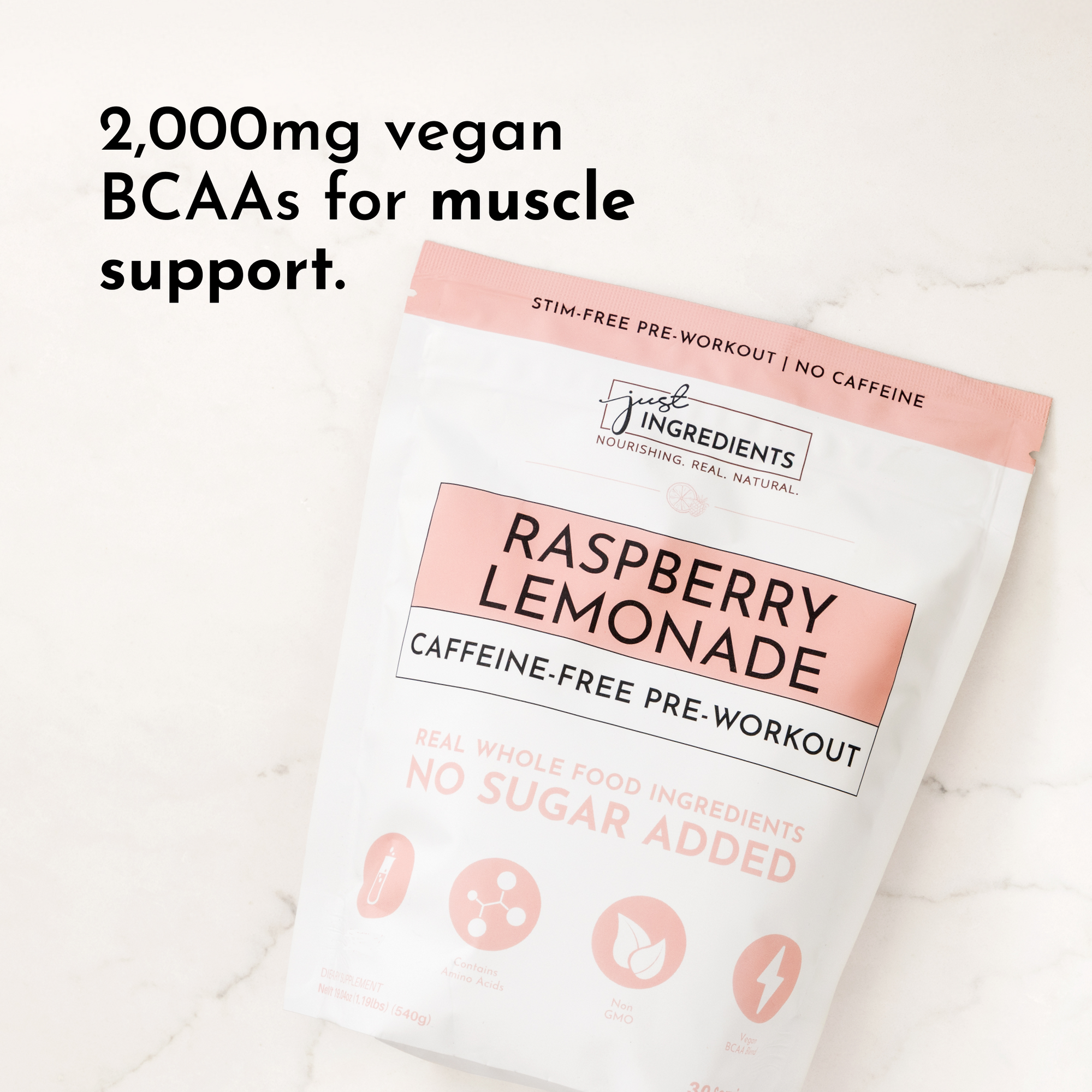 Caffeine-free pre-workout powder package labeled "Raspberry Lemonade" with details on BCAAs and ingredients.