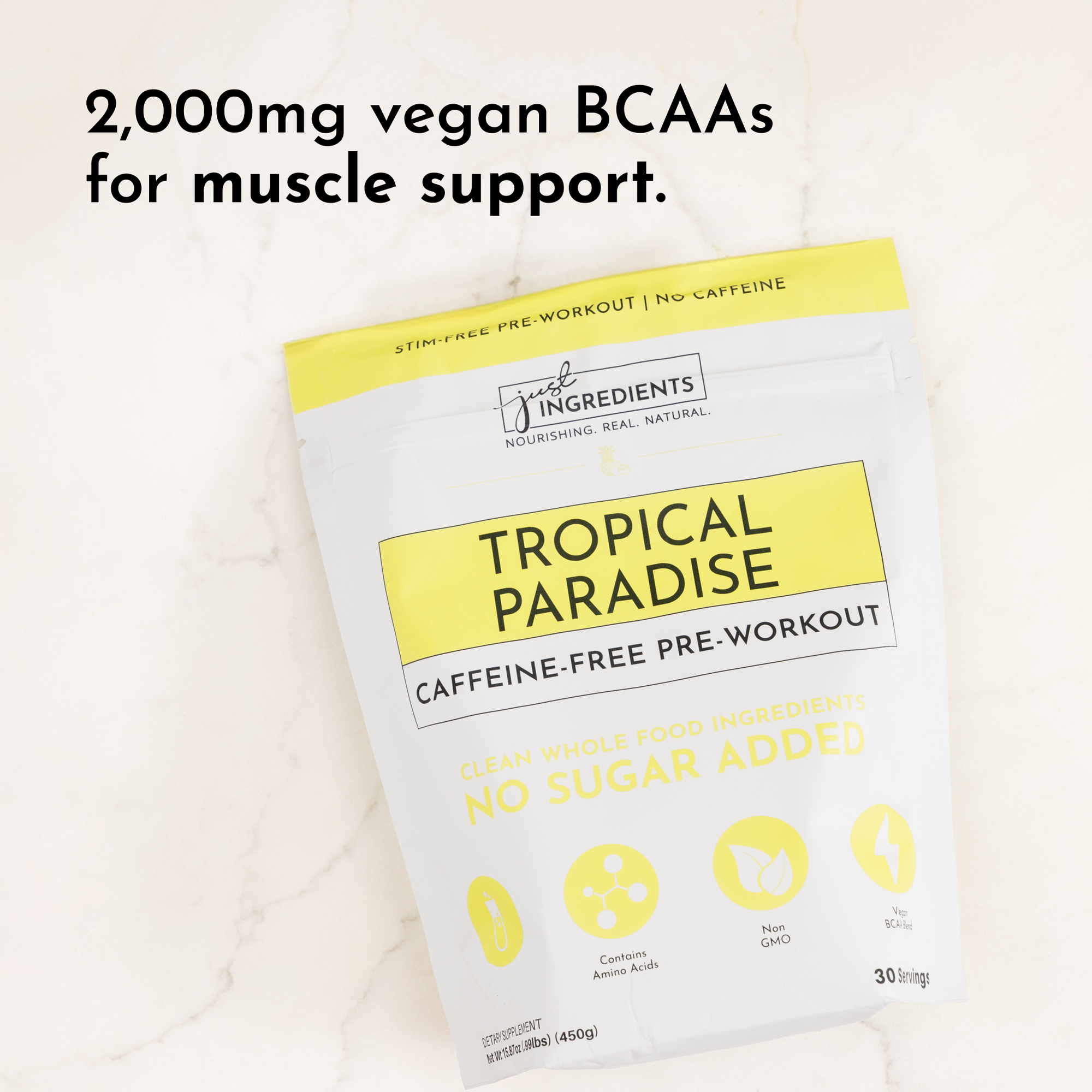 Pouch of Tropical Paradise caffeine-free pre-workout with 2000mg vegan BCAAs, 30 servings, and no sugar added.