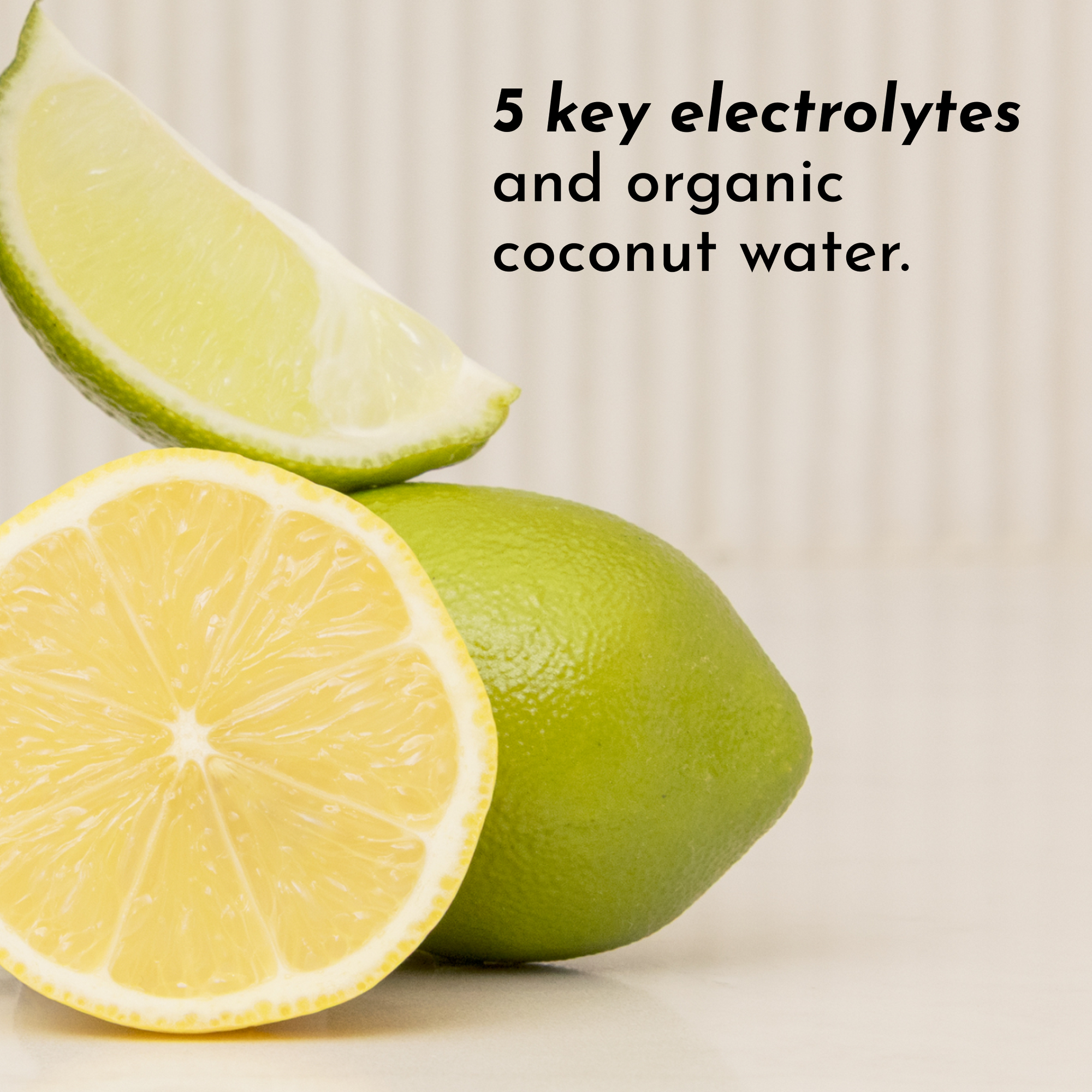 A whole lime and a halved lime are displayed on a surface, with text mentioning electrolytes and coconut water.