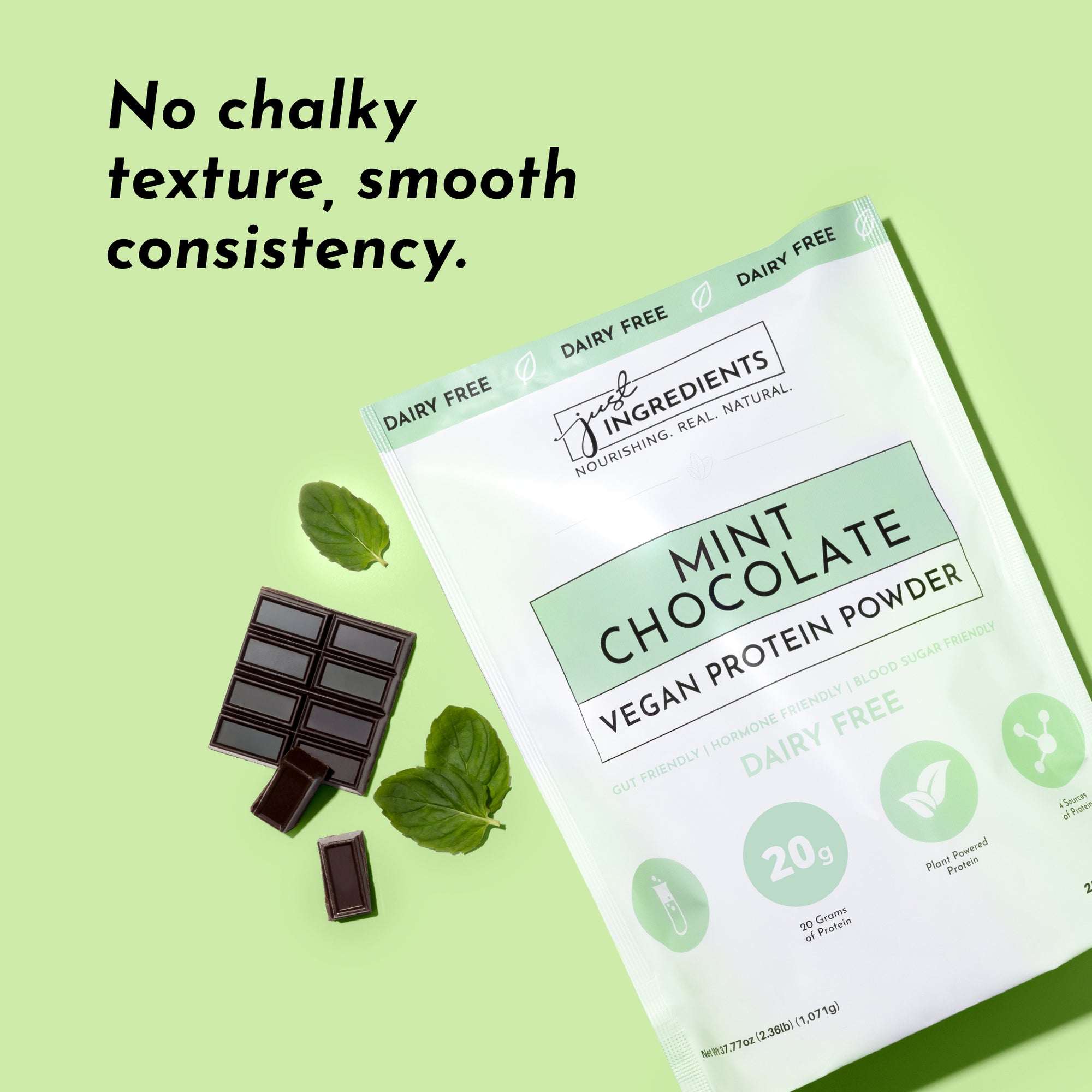Mint chocolate vegan protein powder package with chocolate pieces and mint leaves on a light green background.
