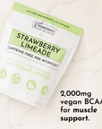 Caffeine-free pre-workout powder in a resealable pouch with strawberry limeade flavor and 2,000mg vegan BCAAs.