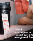 Black shaker bottle with a Guava Mango Pre-Workout stick displayed beside it on a workout mat.