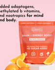 Brightly colored packaging for "Brain + Energy Boost Blood Orange" with orange slices in front.