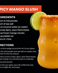 Glass of spicy mango slush with lime wedge garnish and chili-salt rim next to recipe instructions.