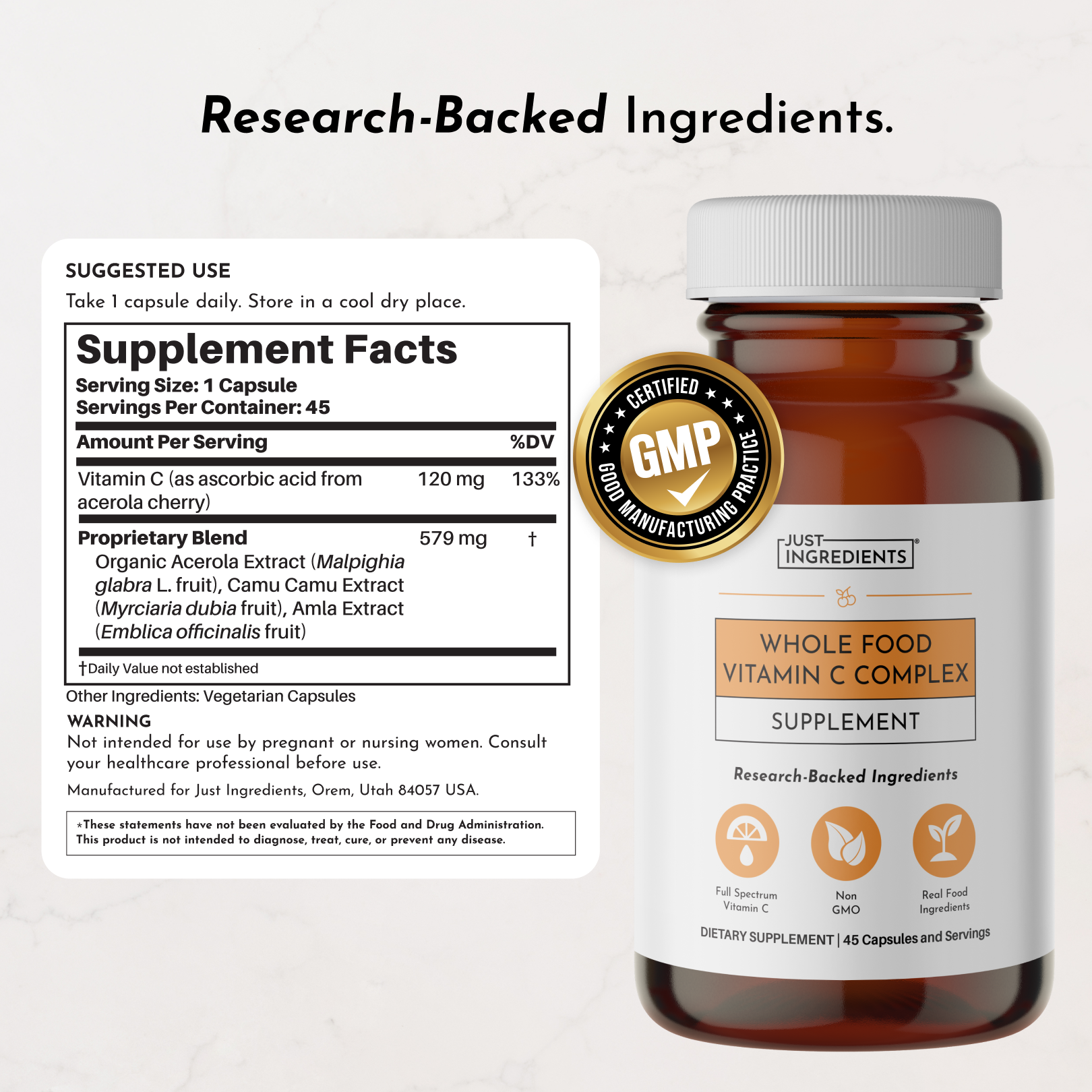 Amber glass bottle of Whole Food Vitamin C Complex supplement with white cap and label showing supplement facts and GMP certi