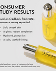 Yellow face serum bottles with silver caps, labeled "just INGREDIENTS," on a reflective surface.