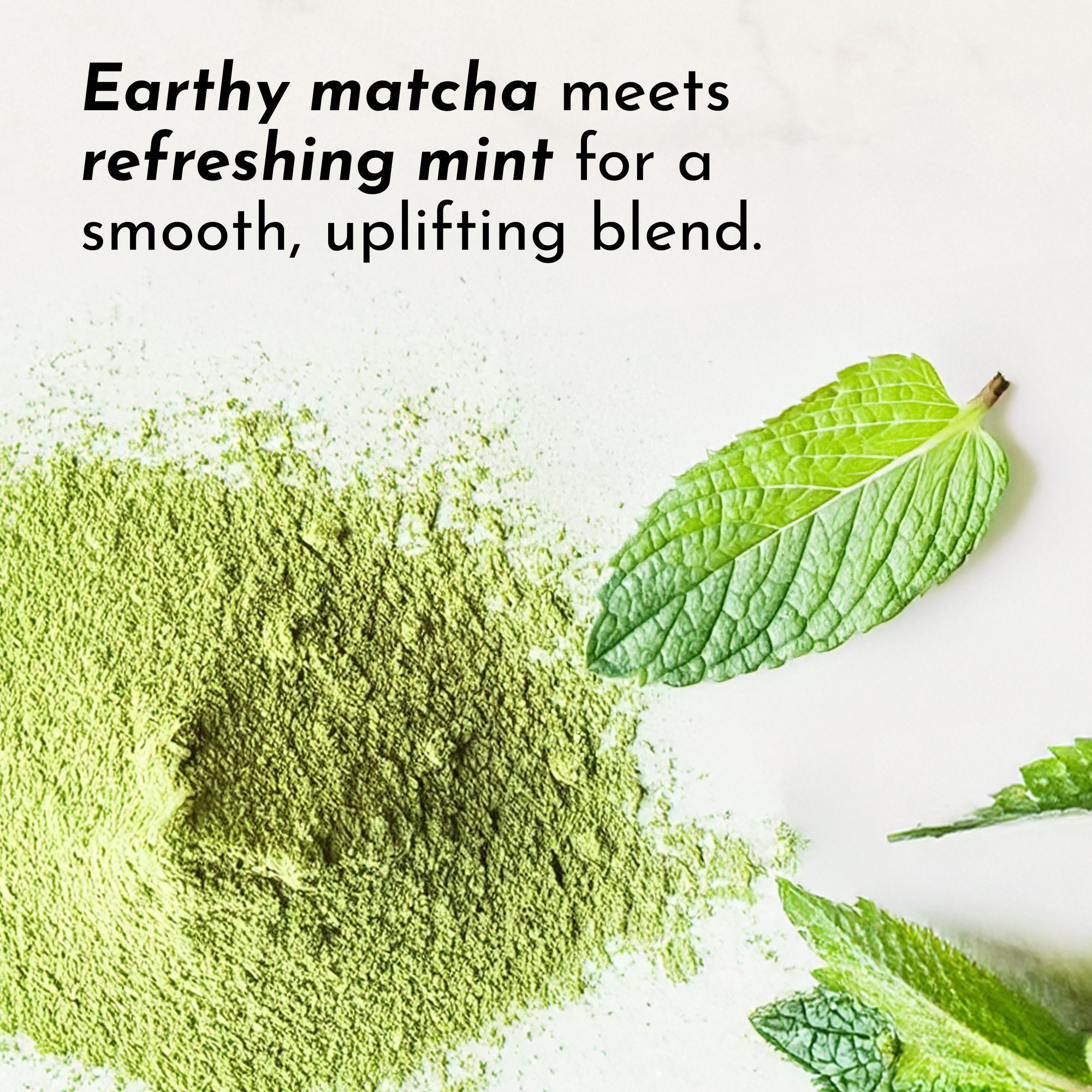 Green matcha powder with fresh mint leaves arranged on white background.