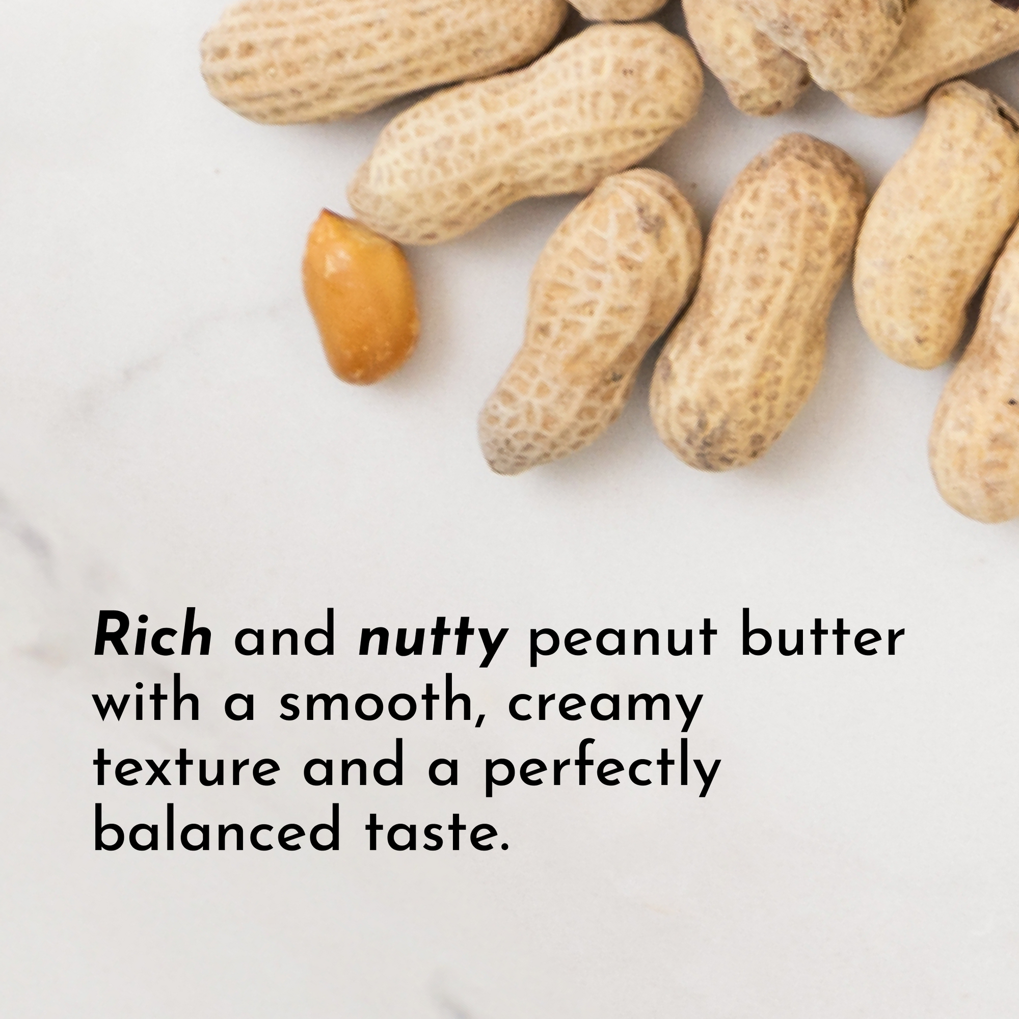 Peanuts in their shells with one unshelled peanut on a light surface.