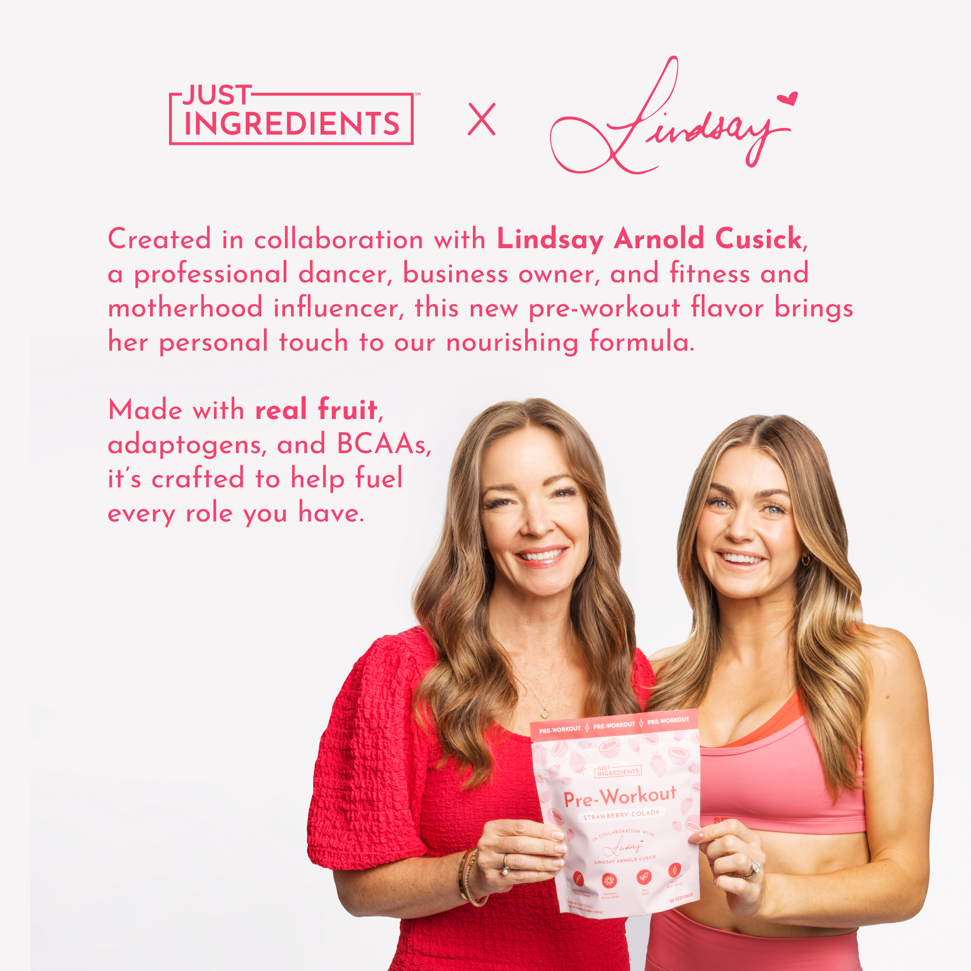 Two women hold a bag of Strawberry Colada Pre-Workout, smiling and wearing fitness attire.