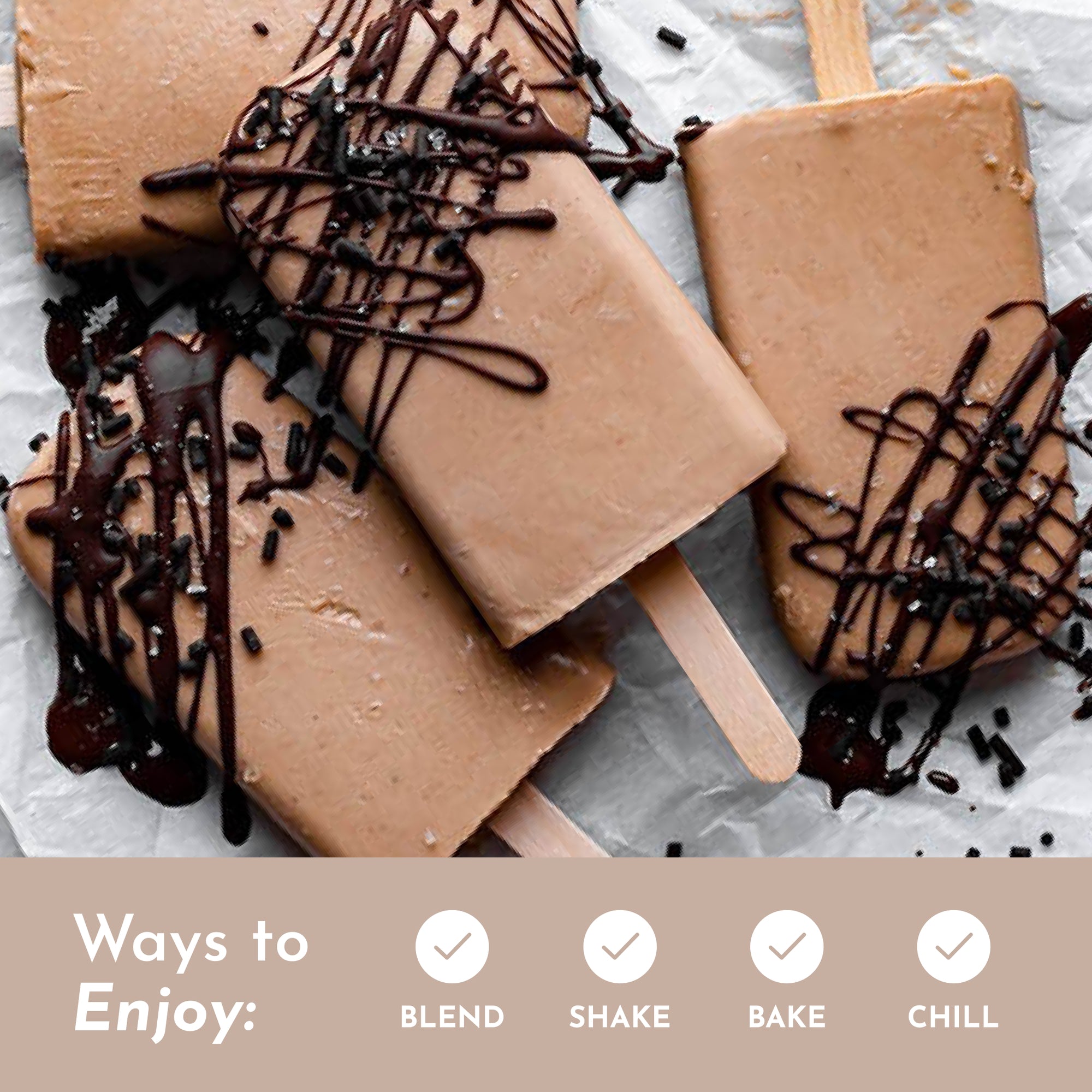 Frozen chocolate coconut popsicles drizzled with chocolate and topped with sprinkles on parchment paper.