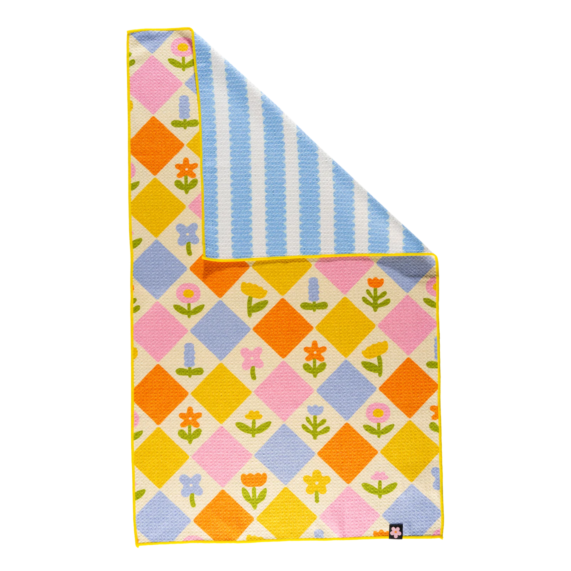 Colorful quilt with geometric pattern on a white background