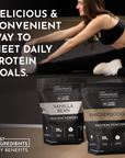 Two protein powder bags labeled "Vanilla Bean" and "Snickerdoodle" on a gym floor with a person stretching in the background.