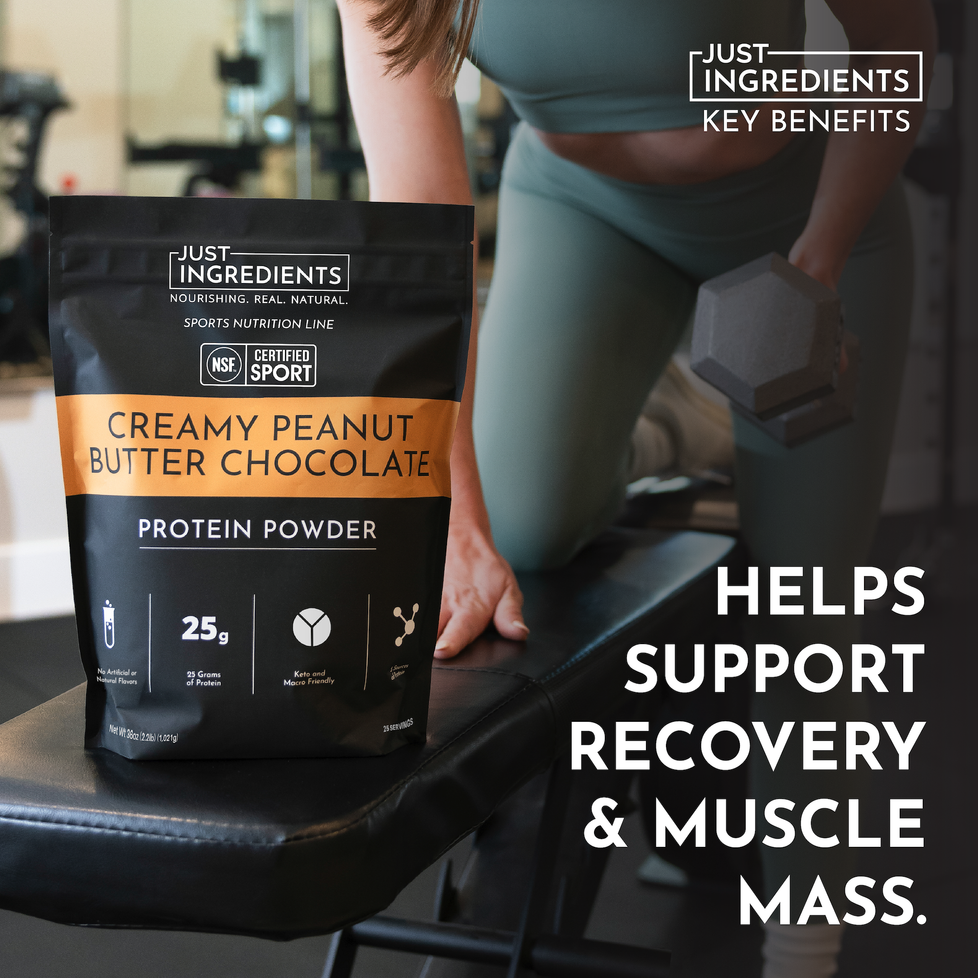 Black and orange protein powder bag labeled "Creamy Peanut Butter Chocolate" on a gym bench with a person lifting weights.