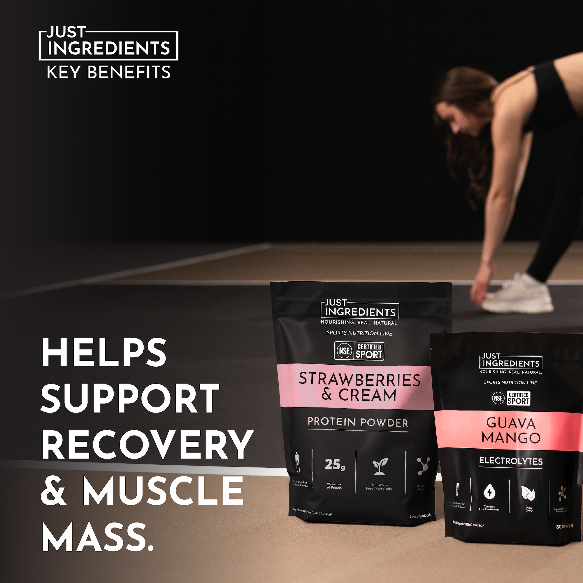 Two protein powder bags on a gym floor, one labeled "Strawberries &amp; Cream" and the other "Guava Mango."