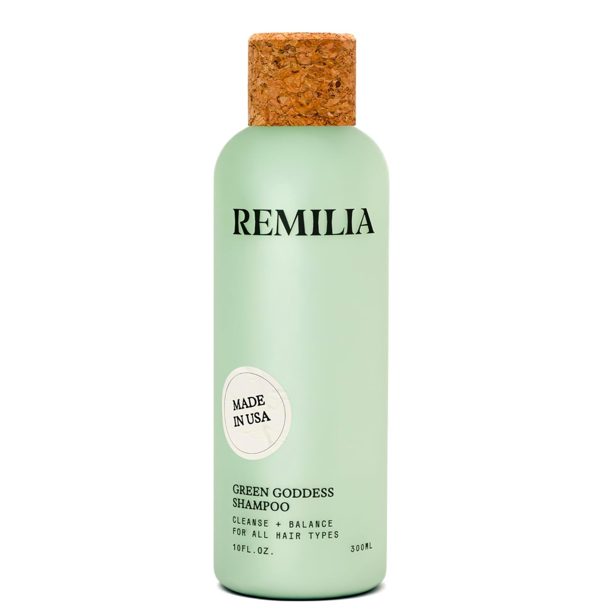 Green shampoo bottle with a cork lid, labeled "REMILIA GREEN GODDESS SHAMPOO," 10 fl oz, for all hair types.
