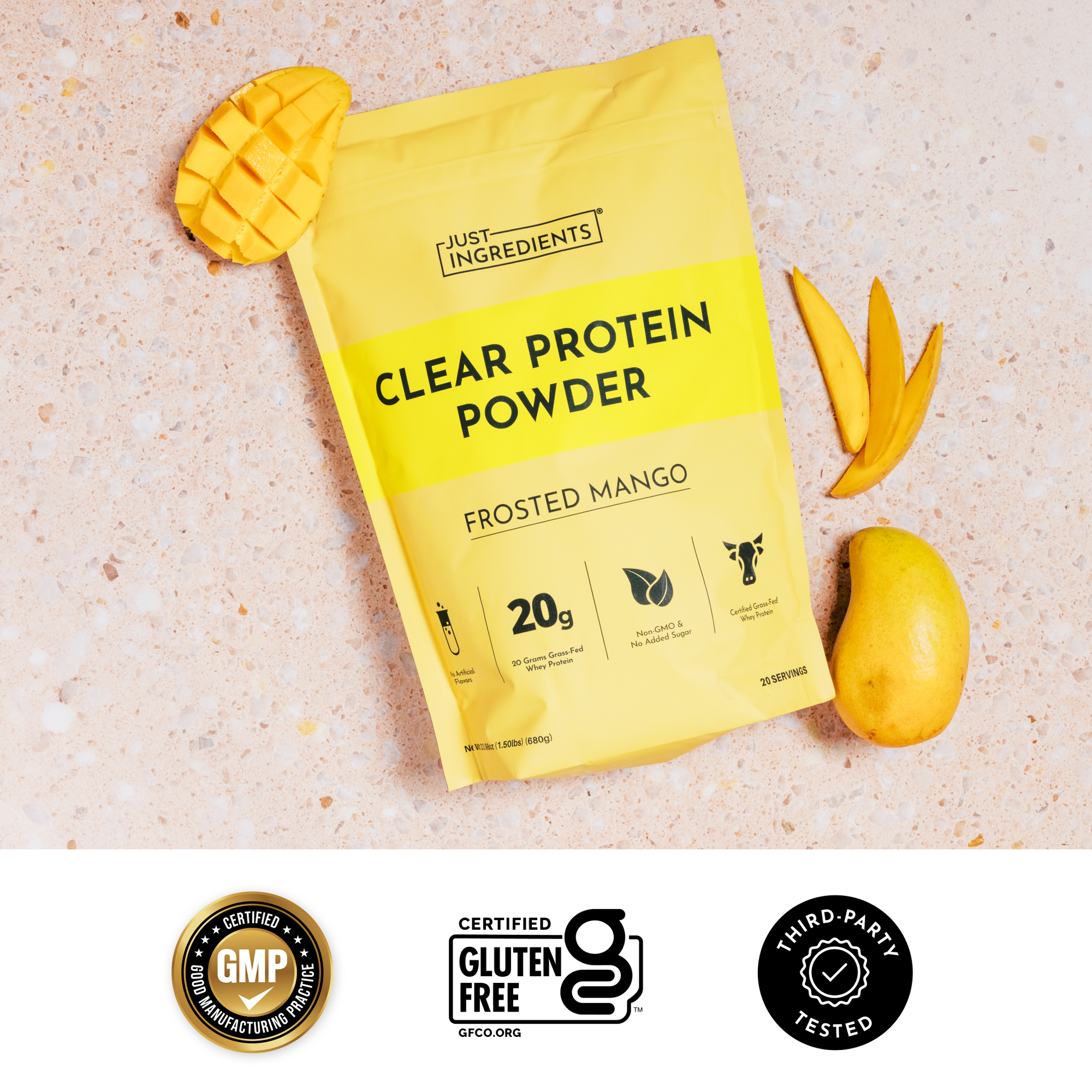 Hand holding yellow Frosted Mango Clear Protein Powder pouch with product icons and packaging details.