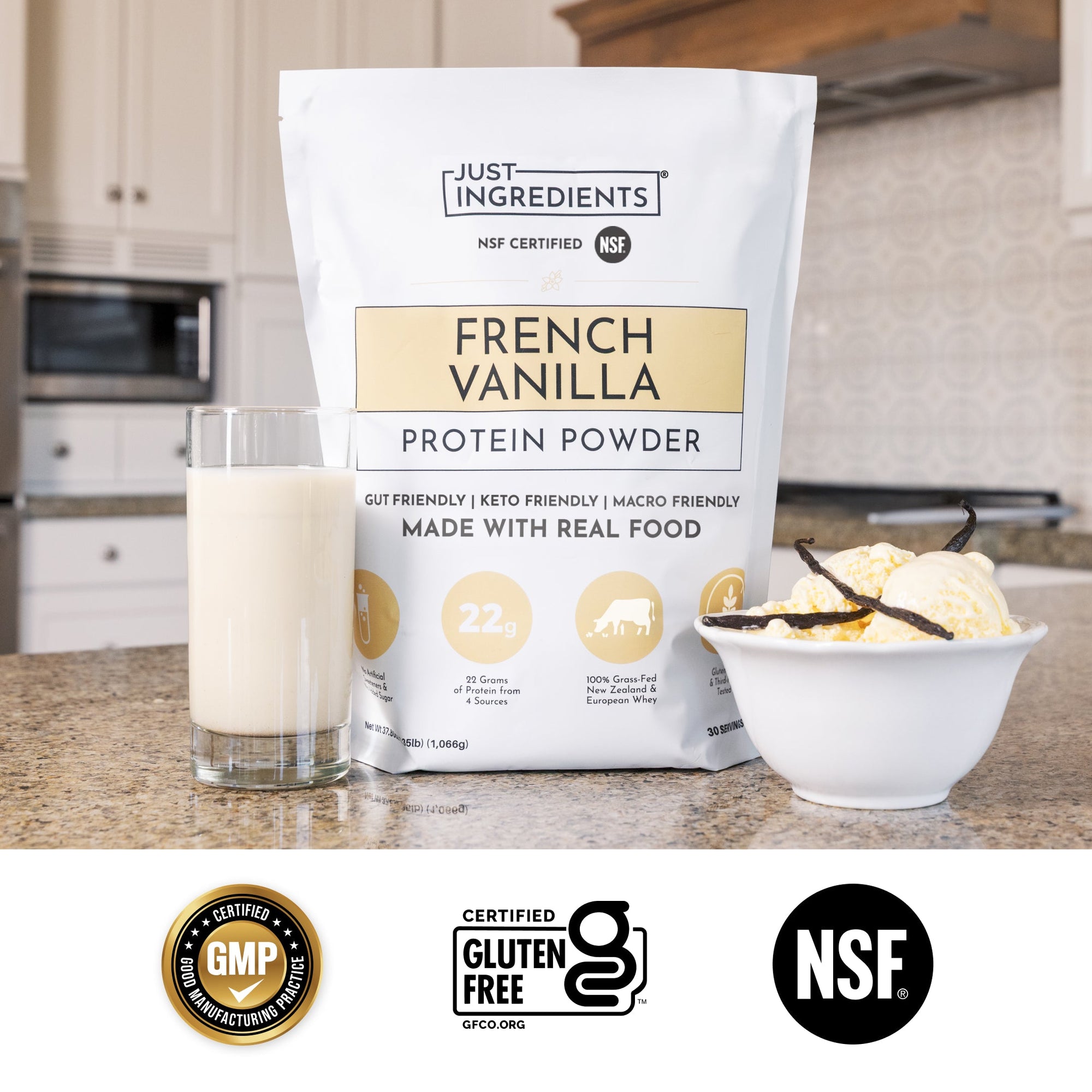 Bag of French vanilla protein powder beside a glass of milk and a vanilla bean.