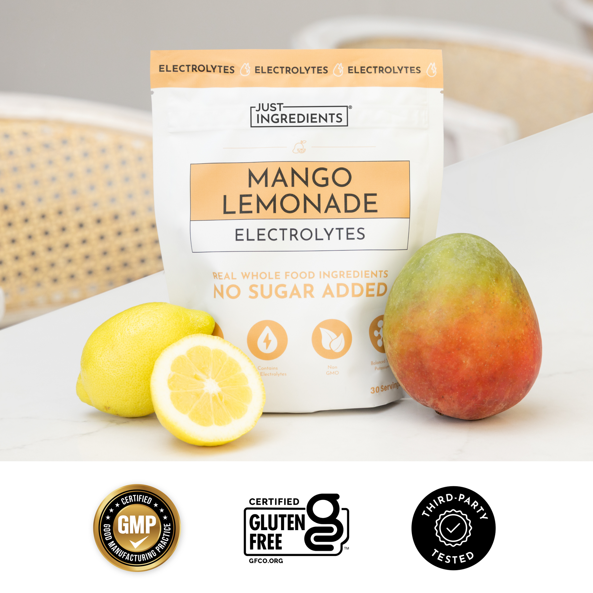 Pink benefits graphic with colored scoops highlighting Mango Lemonade Electrolytes features
