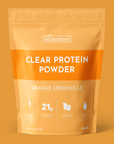 Orange Creamsicle clear protein powder pouch with label, nutrition facts, and serving details on white background.