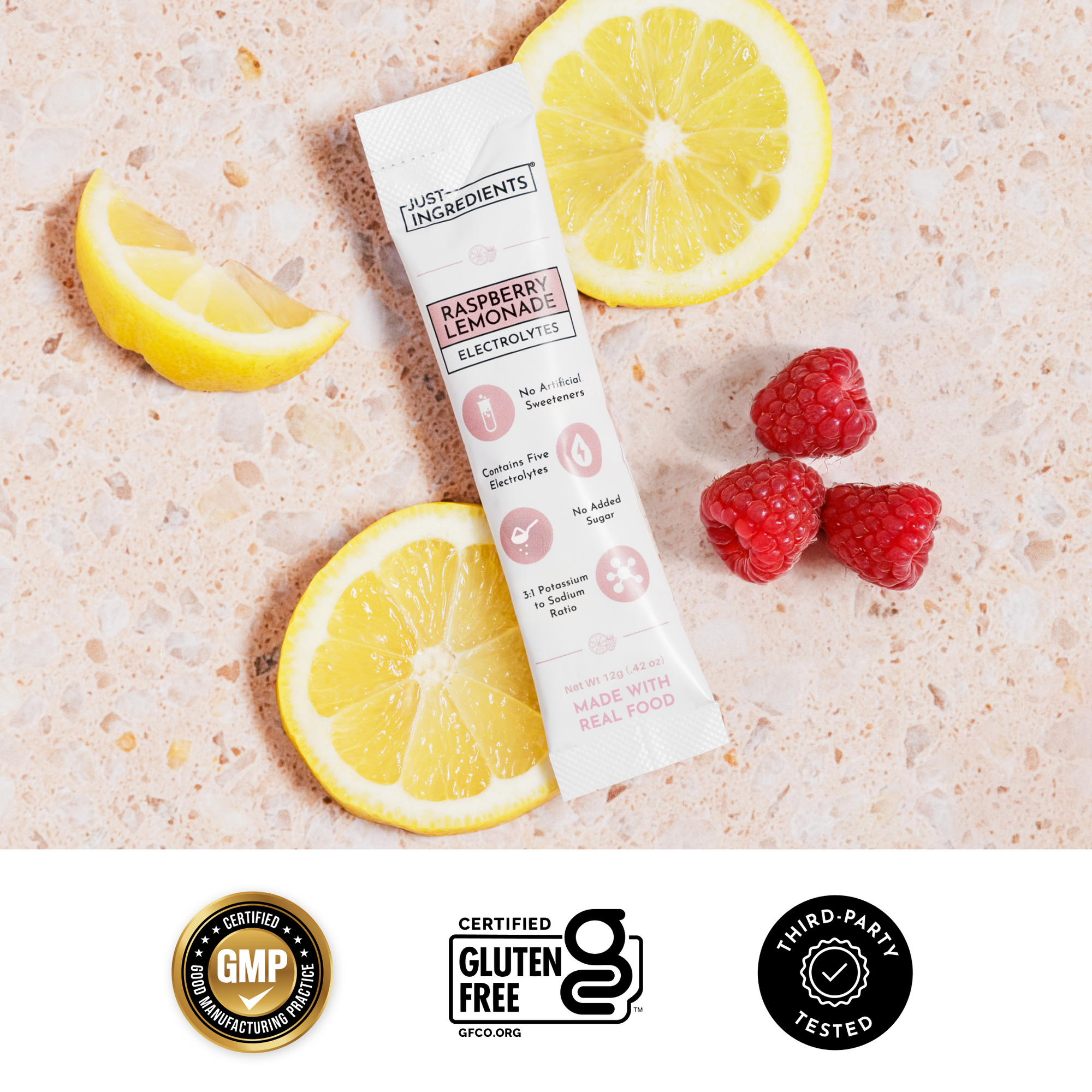 Benefit checklist graphic: real fruit, no added sugar, no artificial flavors — Raspberry Lemonade Electrolytes.