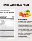 Single can of Sunrise Splash Energy + Brain Boost surrounded by strawberries, orange slices and pineapple.