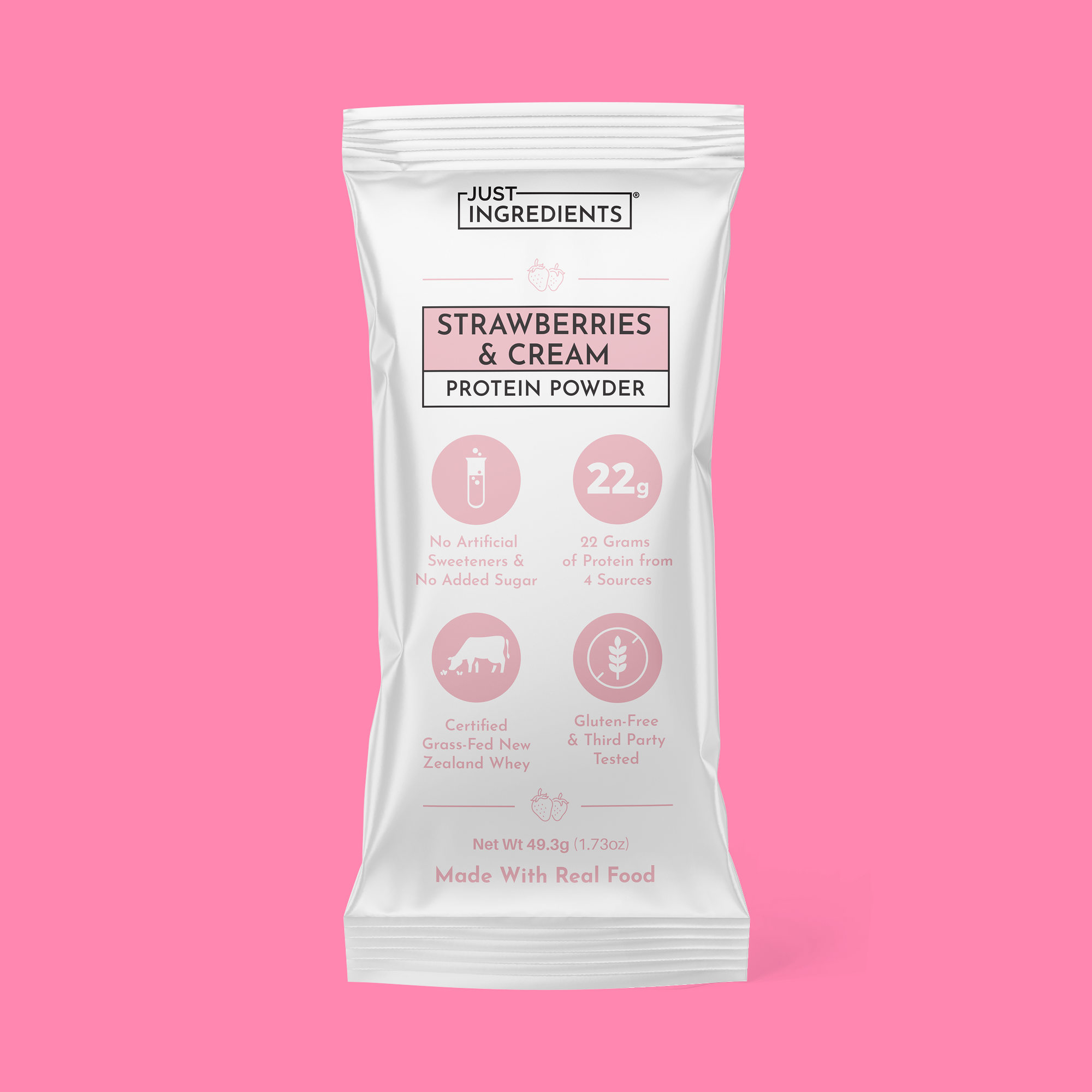 White stick pack packaging with pink accents reading “Strawberries &amp; Cream Protein Powder” and nutrition callouts