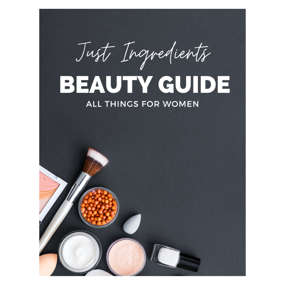Flat lay of beauty products including brushes, creams, powders, and a nail polish on a dark background.